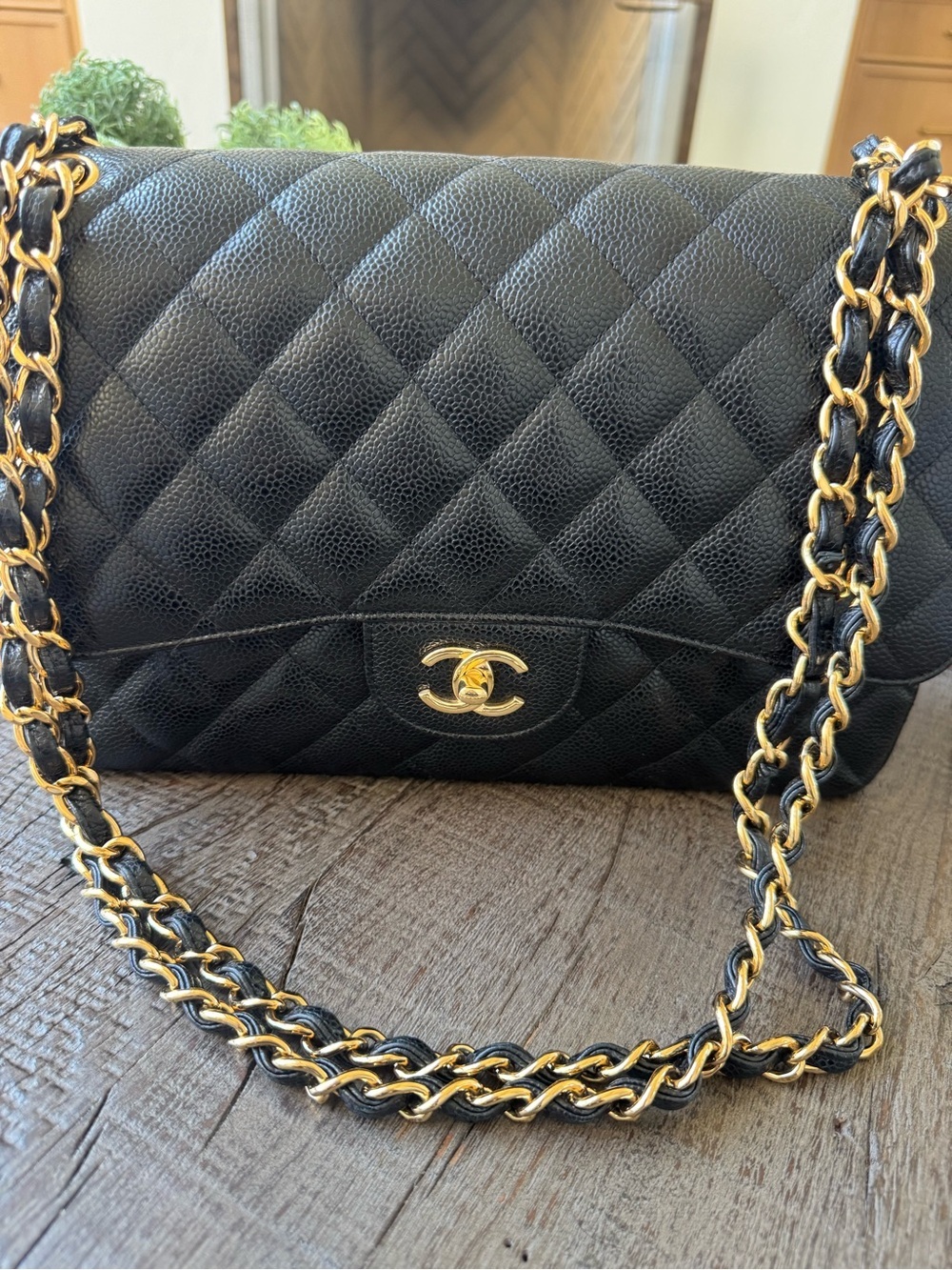 CHANEL Microchipped Jumbo Black Quilted Caviar Leather with Gold Hardware